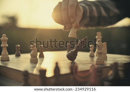 Man playing chess Royalty-Free Stock Photo #234929116
