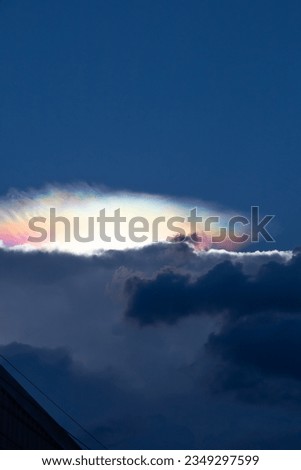 Cloud iridescence or irisation is a colorful optical phenomenon that occurs in a cloud and appears in the general proximity of the Sun or Moon. The colors resemble those seen in soap bubbles and oil o