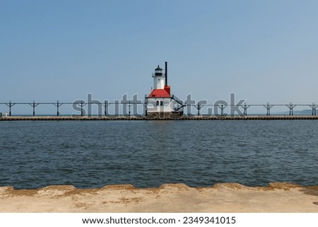 The St. Joseph Lighthouse on Lake Michigan on a sunny afternoon. Royalty-Free Stock Photo #2349341015
