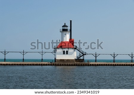 The St. Joseph Lighthouse on Lake Michigan on a sunny afternoon. Royalty-Free Stock Photo #2349341019