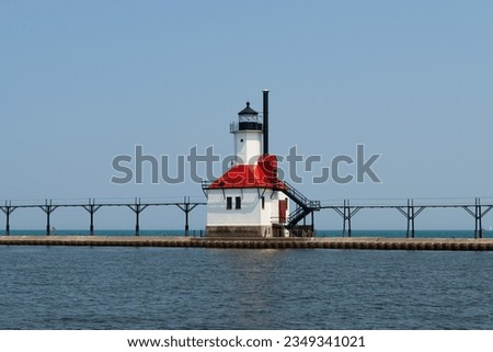 The St. Joseph Lighthouse on Lake Michigan on a sunny afternoon. Royalty-Free Stock Photo #2349341021