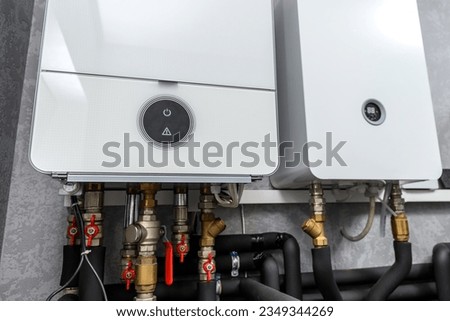 Modern electric boiler room in the house Royalty-Free Stock Photo #2349344269