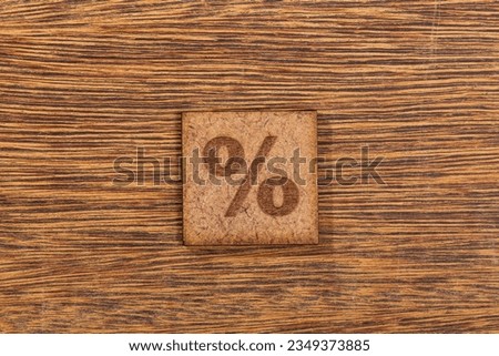 Percent Sign In Square Wooden Tiles - Symbol %, On Wooden Background.