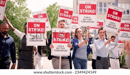Workers Strike Demonstration In City. Labor Union March. Protest Rally Royalty-Free Stock Photo #2349424149