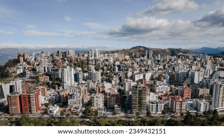 aerial view of the city of quito modern buildings growing city