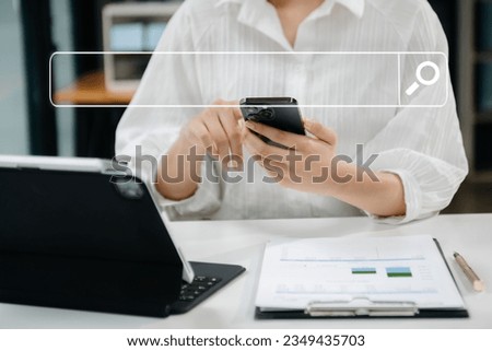 Searching Browsing Internet Data Information Networking Concept with blank search bar.man working with mobile phone and laptop computer VR icon in office
