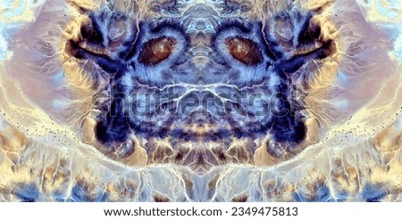 atavistic faces,   abstract symmetrical photograph of the deserts of Africa from the air,