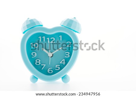 blue alarm clock isolated on white background