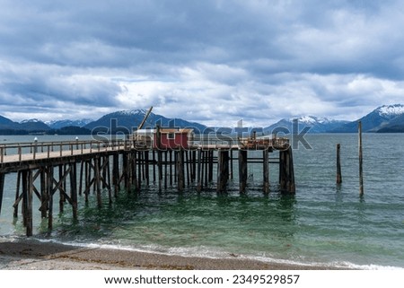 Icy Strait Point, Alaska. Cannery Dock near Hoonah on Chichagof Island, . Former commercial fish packing company is now a Native Alaskan privately owned and operated cruise destination.  Royalty-Free Stock Photo #2349529857