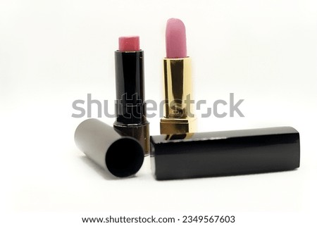 Lipstick is a cosmetic product used for enhancing the appearance of lips by adding color and vibrancy.