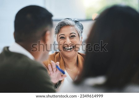 Team, happy woman or business people in meeting laughing at funny joke in discussion or collaboration together. Smile, leadership or excited mature mentor talking or speaking of ideas to employees Royalty-Free Stock Photo #2349614999