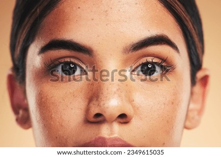 Woman, skin and closeup in studio portrait with beauty, cosmetics and natural glow on face by background. Girl, model and facial zoom with change, melasma and skincare for health, shine and clean Royalty-Free Stock Photo #2349615035