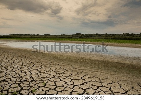 Cracked earth as a result of drought and global warming.