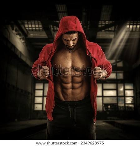 Photo of a man wearing a red jacket and black pants without a shirt Royalty-Free Stock Photo #2349628975