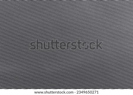 Carbon fiber background. Texture of black fabric for tailoring, Cloth. Textile
