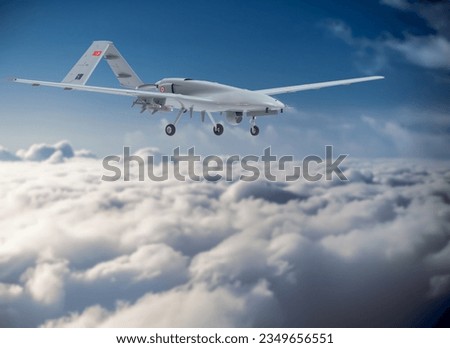 Bayraktar tb2 unmanned aerial vehicle gliding through the clouds. Bayraktar TB-2 combat drone in flight over the clouds. Royalty-Free Stock Photo #2349656551