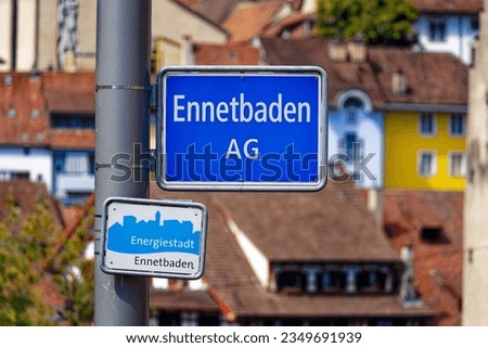 Close-up of blue and white road sign at Swiss town of Ennetbaden with label Energy City on a sunny summer day. Photo taken August 19th, 2023, Ennetbaden, Canton Aargau, Switzerland.