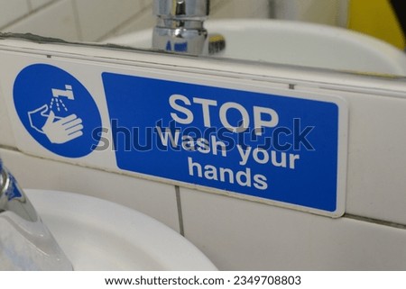 Southend on Sea, United Kingdom - July, 22, 2023: Stop wash your hands sign displayed