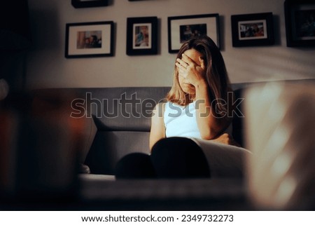
Unhappy Woman Feeling Desperate and Heartbroken. Stressed girl suffering a migraine acting concerned 
 Royalty-Free Stock Photo #2349732273
