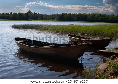 Wooden rowing boats in the Gulf of Finland near the town of Hamina, Finland (Suomi) Royalty-Free Stock Photo #2349746257