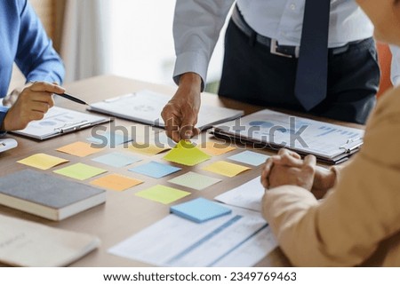 Business People brainstorming Meeting Design Ideas use post it notes to share idea professional investor start up project business brainstorming planning in office. Royalty-Free Stock Photo #2349769463
