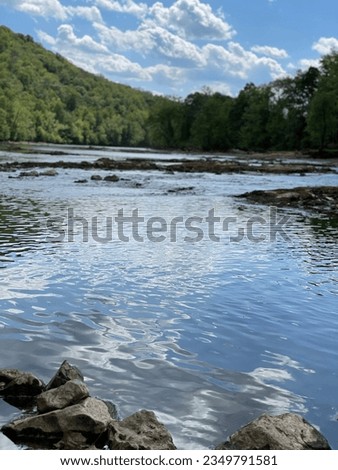 Clinch River next to Weir Dam below Norris Dam, TN Royalty-Free Stock Photo #2349791581