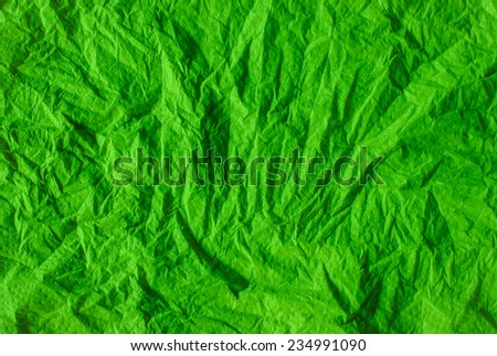 Crumpled green color tissue paper