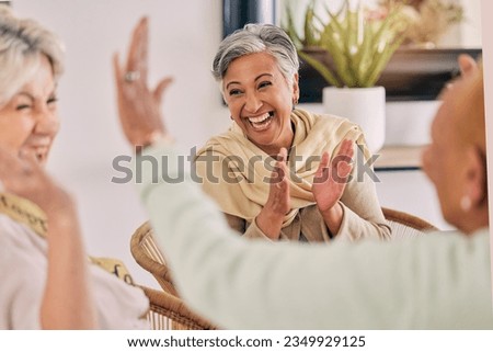 Senior women, happy and celebration at a birthday party or event with clapping and excited. Elderly friends, smile and laughing in retirement and nursing home with conversation, friendship and fun