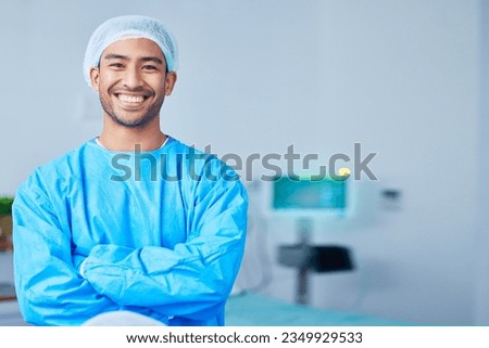 Portrait, surgeon and Asian man with arms crossed in hospital, healthcare and wellness. Face, happy doctor and medical professional, expert nurse and confident surgery employee in scrubs in Cambodia Royalty-Free Stock Photo #2349929533