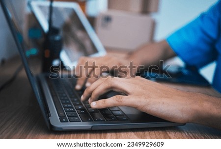 Hands, laptop and surveillance with a security guard in a CCTV room closeup to monitor criminal activity. Computer, safety and typing with an officer searching for evidence or information online Royalty-Free Stock Photo #2349929609
