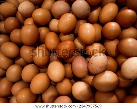 close-up of egg full frame. background of fresh eggs for sale at a market, full frame Royalty-Free Stock Photo #2349937569