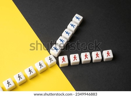 It splits into two currents. People are divided into two groups. Opposition factions. Lack of consensus. Ideological conflict. Rivalry to improve work efficiency. Dividing, splitting up. Royalty-Free Stock Photo #2349946883
