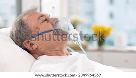 Oxygen mask, hospital and senior man with ventilation and healthcare support in a clinic. Elderly patient, medical care and emergency room with male person at a doctor for wellness and health Royalty-Free Stock Photo #2349964569