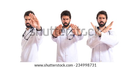 Set of Doctor making stop sign over white background