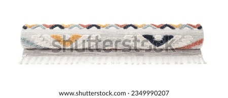 Rolled carpet with pattern on white background. Interior element Royalty-Free Stock Photo #2349990207