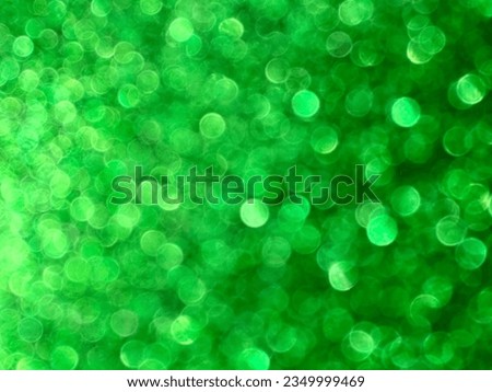 Closeup of green  glittery bokeh background