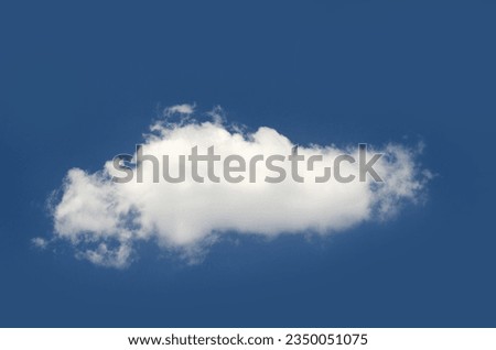 Single cloud isolated over blue sky background. White cloud photo, cute fluffy puffy cloud and gradient summer sky Royalty-Free Stock Photo #2350051075