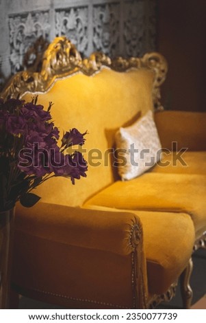 Sofa at a waiting room. Beautiful and luxurious yellow couch 