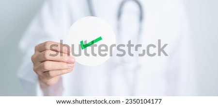 Doctor show Right symbol paper. True and false, accept and rejected, evaluation, Diagnosis, Vote, Poll, Yes or No, Health, Medical and Survey concepts