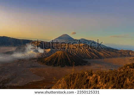 Morning sunrise at Mount Bromo, an active volcano and part of the Tengger Range in East Java, Indonesia during August.