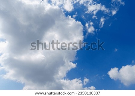 Puffy clouds. Clouds and dark blue skys background textures.