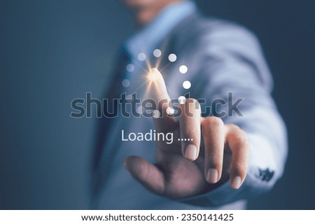 Businessman Touching loading data application. download bar digital business data website. Concept of waiting for loading bar Royalty-Free Stock Photo #2350141425