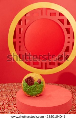 Close up moon cakes with red background. Moon cakes, which are Vietnamese pastries traditionally eaten during the Mid-Autumn Festival