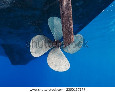 Propeller from an old boat in the Mediterranean Sea Royalty-Free Stock Photo #2350157179