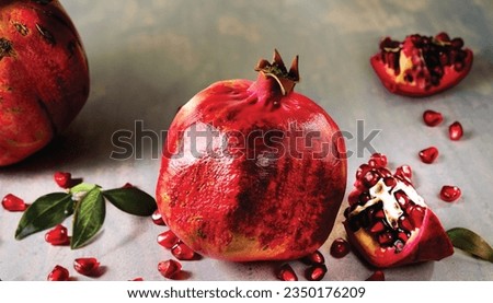 
The image you sent me shows a group of pomegranates sitting on top of a table