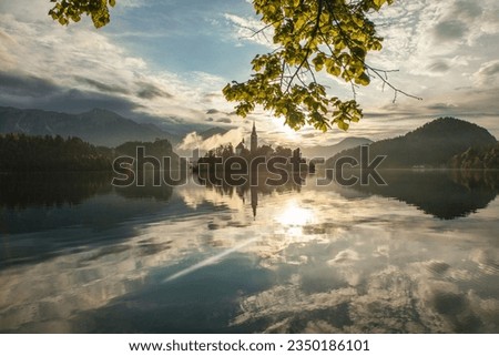 Lake Bled  Reflections in the Julian Alps, European Alps Bled, Radovljica Slovenia Royalty-Free Stock Photo #2350186101