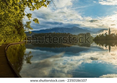 Lake Bled  Reflections in the Julian Alps, European Alps Bled, Radovljica Slovenia Royalty-Free Stock Photo #2350186107