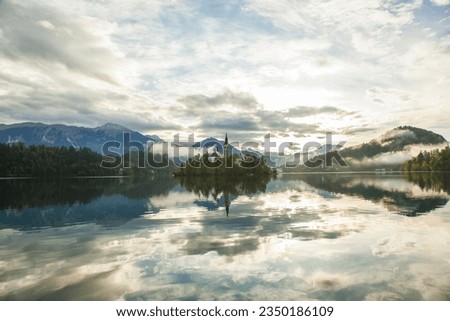 Lake Bled  Reflections in the Julian Alps, European Alps Bled, Radovljica Slovenia Royalty-Free Stock Photo #2350186109