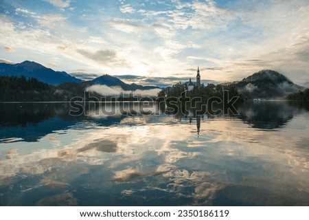 Lake Bled  Reflections in the Julian Alps, European Alps Bled, Radovljica Slovenia Royalty-Free Stock Photo #2350186119