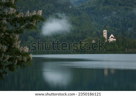 Lake Bled  Reflections in the Julian Alps, European Alps Bled, Radovljica Slovenia Royalty-Free Stock Photo #2350186121
